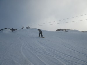 Snowboarders carving the Mawson slope May 2015