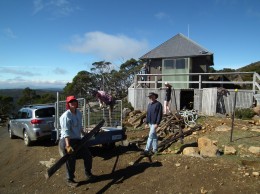 Kay Sigrist, Andrew Briggs, Stephen Webber and Elise Sigrist get into the swing of cleaning up the belt issue hut.